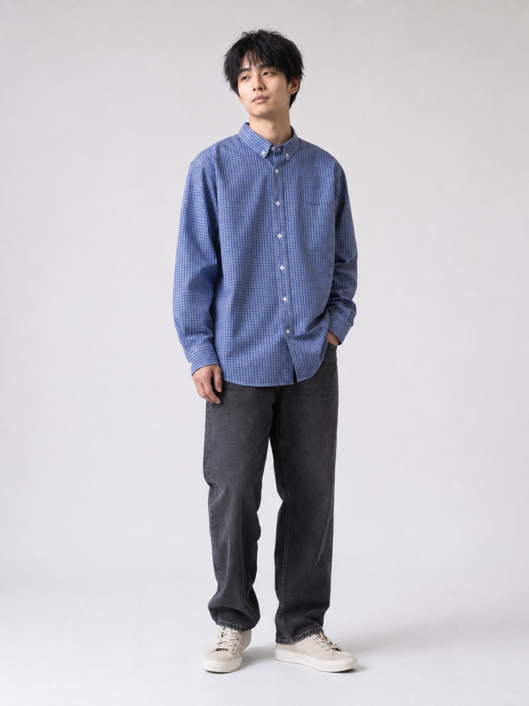 [color:blue] Blue plaid cotton shirt on Japanese male model, relaxed three-quarter pose
