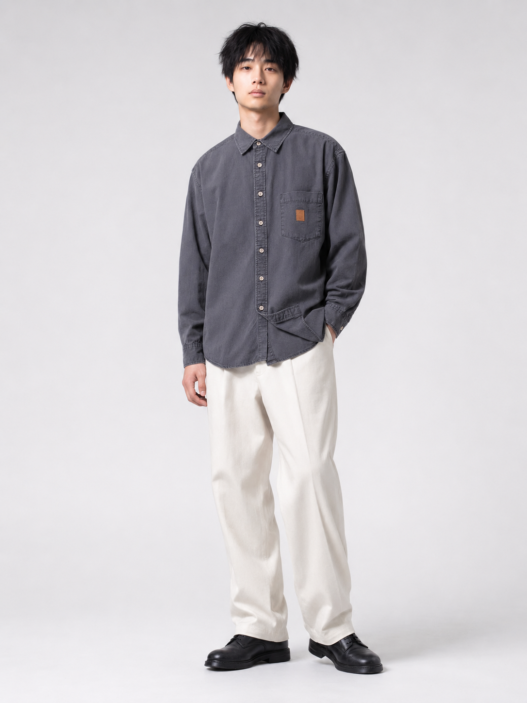[color:dark-gray] Washed utility shirt in dark gray, model front view