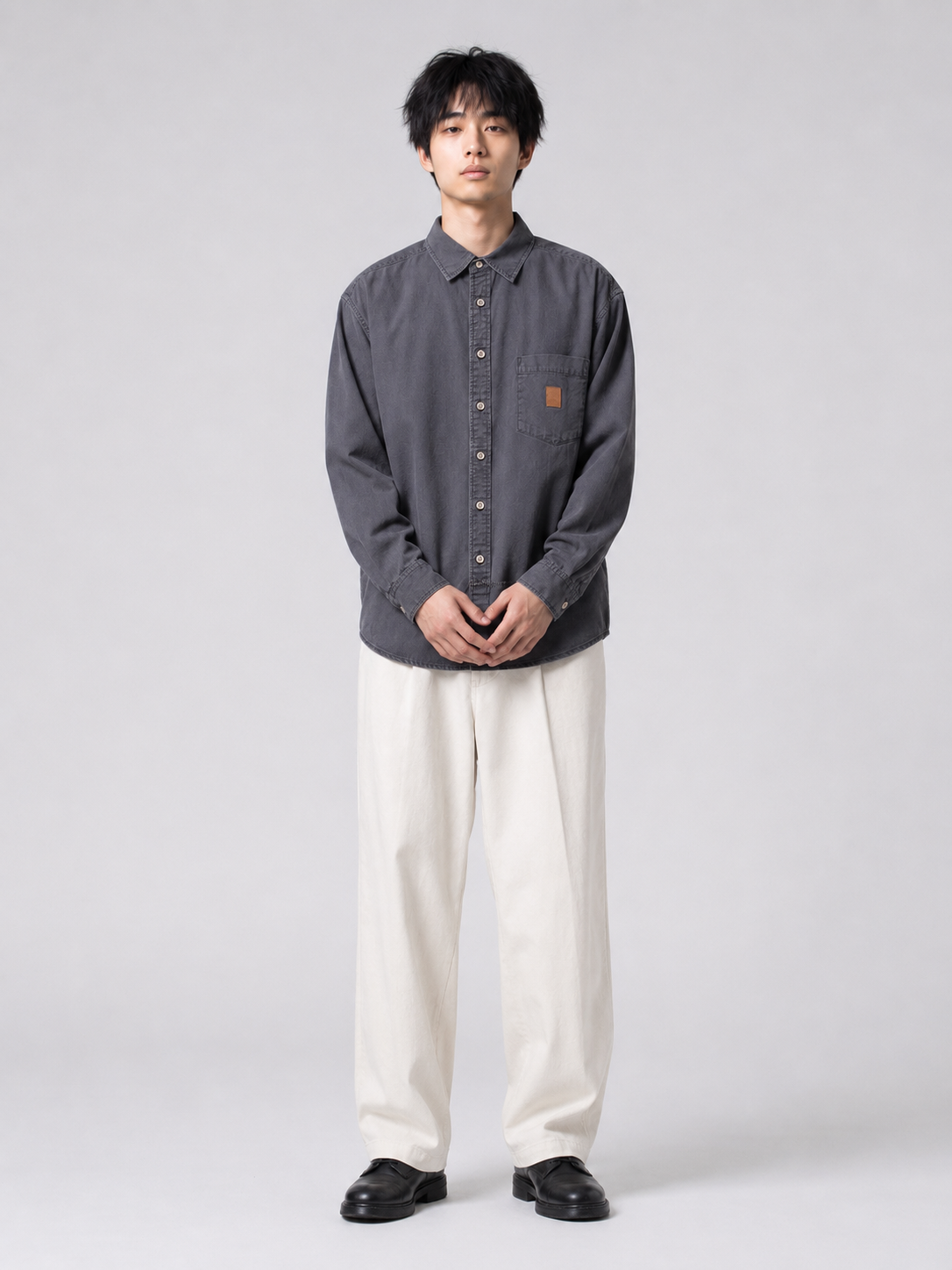 [color:dark-gray] Washed utility shirt in dark gray, model relaxed front view
