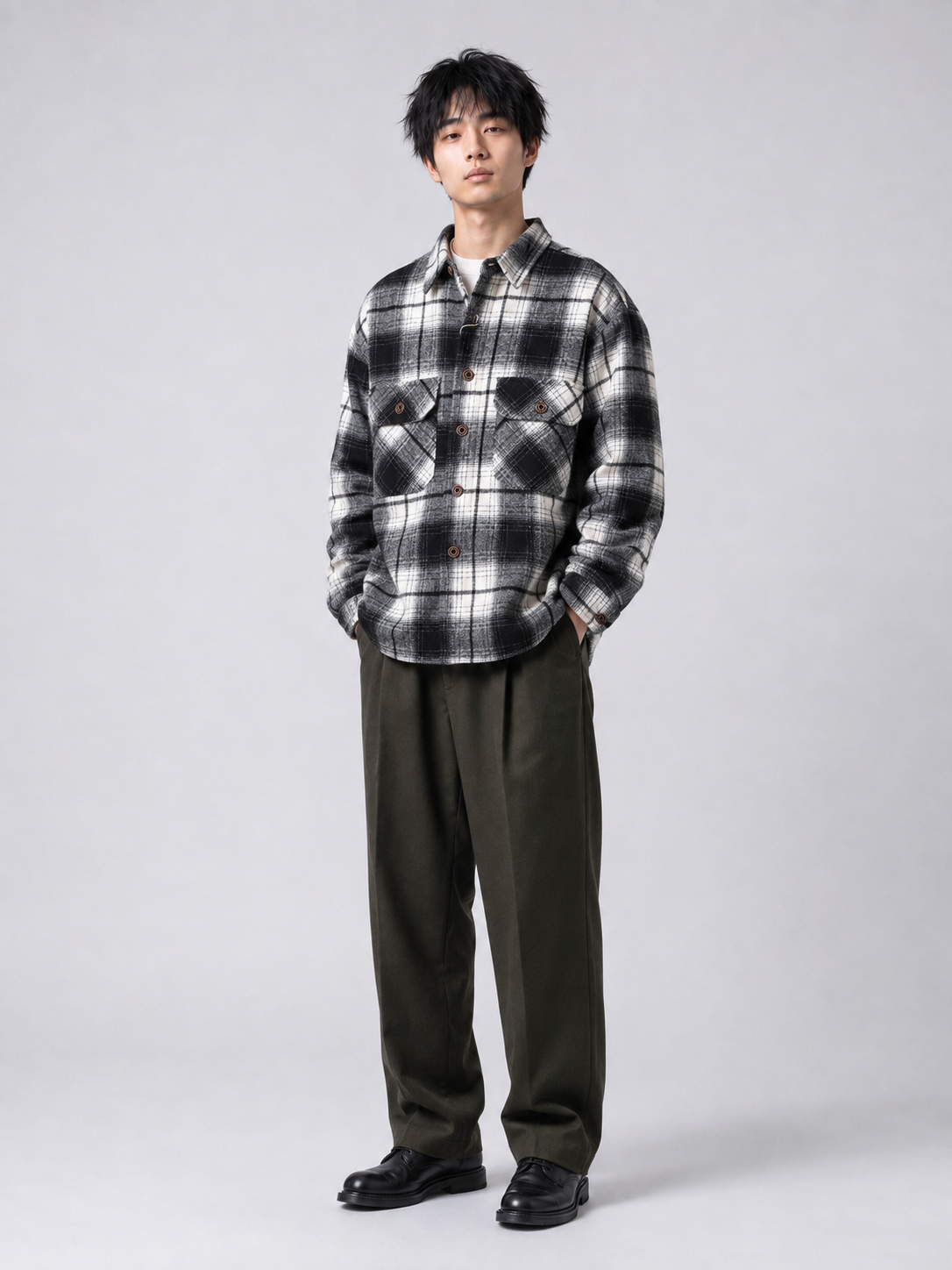 [color:black-and-white-plaid] Fleece-lined plaid shirt jacket in Black and White Plaid, model 1
