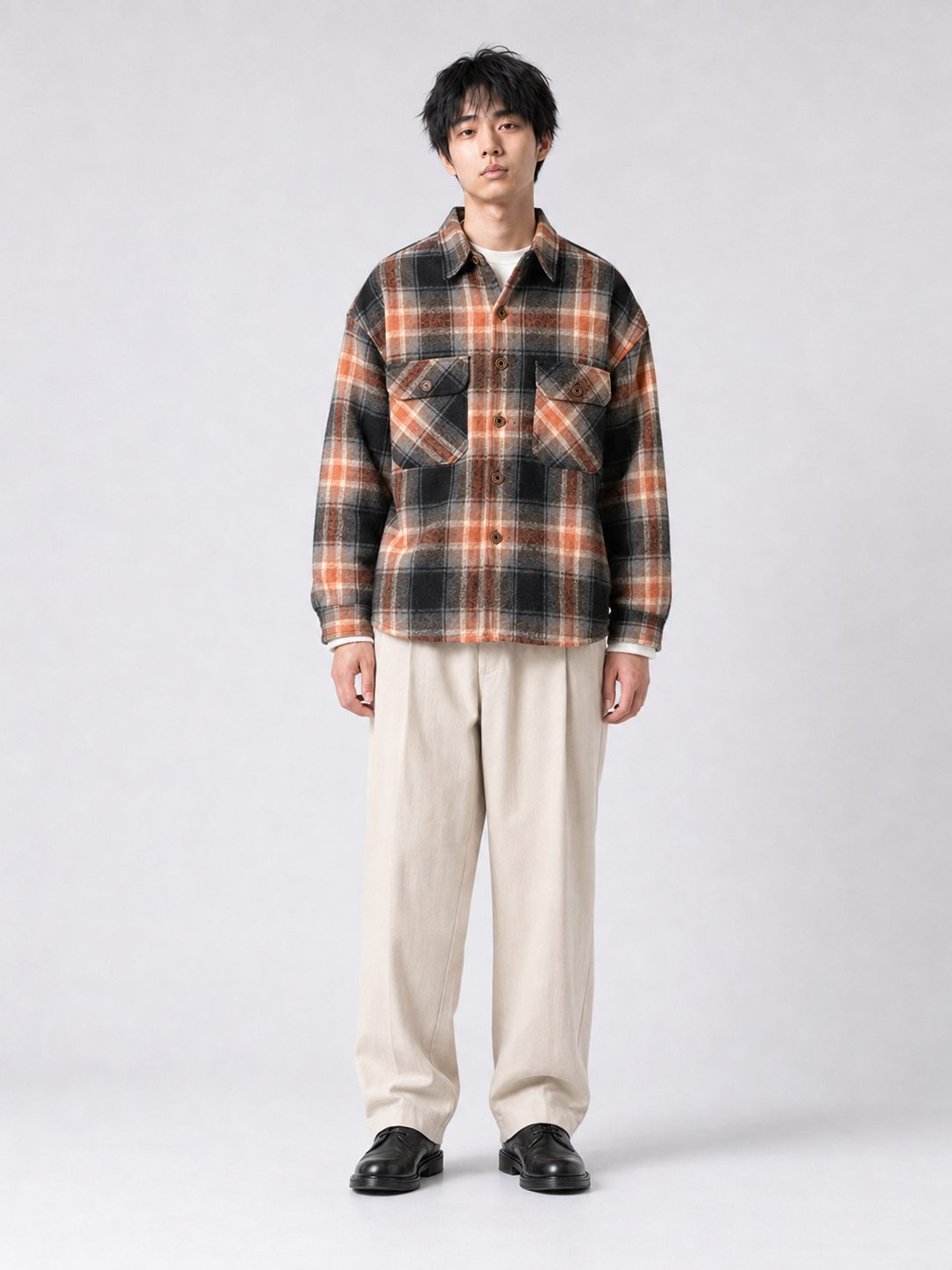 [color:black-orange-grid] Fleece-lined plaid shirt jacket in Black Orange Grid, model 2
