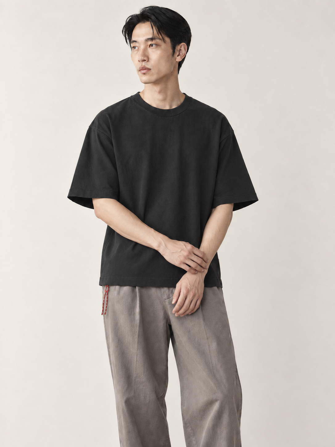 [color:dark-gray] Drop-Shoulder Crewneck Tee — model studio view