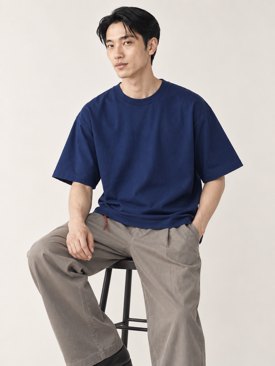 [color:deep-blue] Drop-Shoulder Crewneck Tee — model studio view