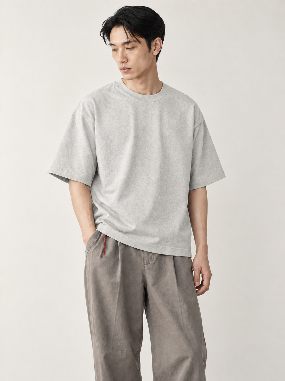 [color:heather-gray] Drop-Shoulder Crewneck Tee — model studio view