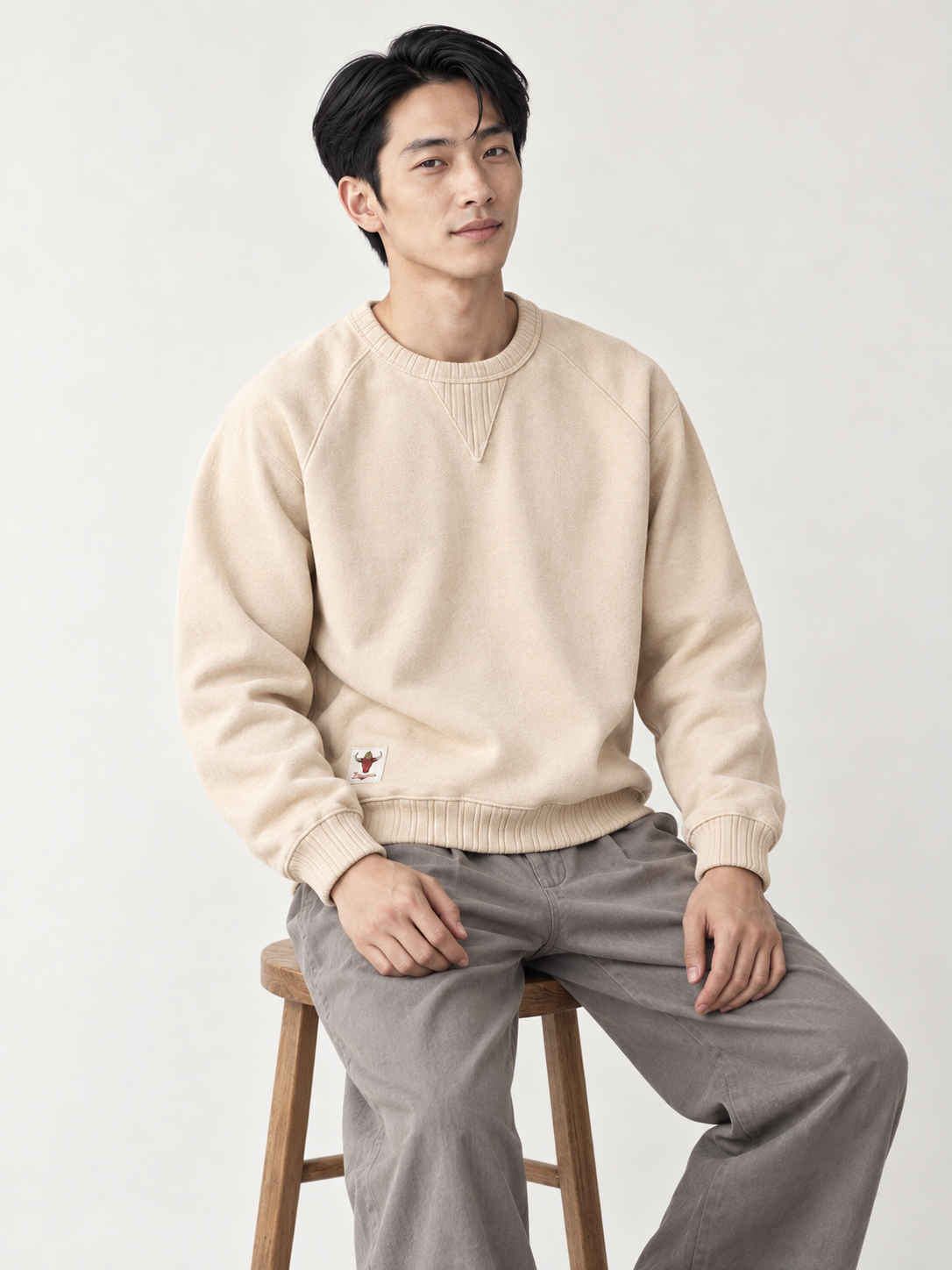 [color:cream] Washed Crewneck Sweatshirt — model studio view