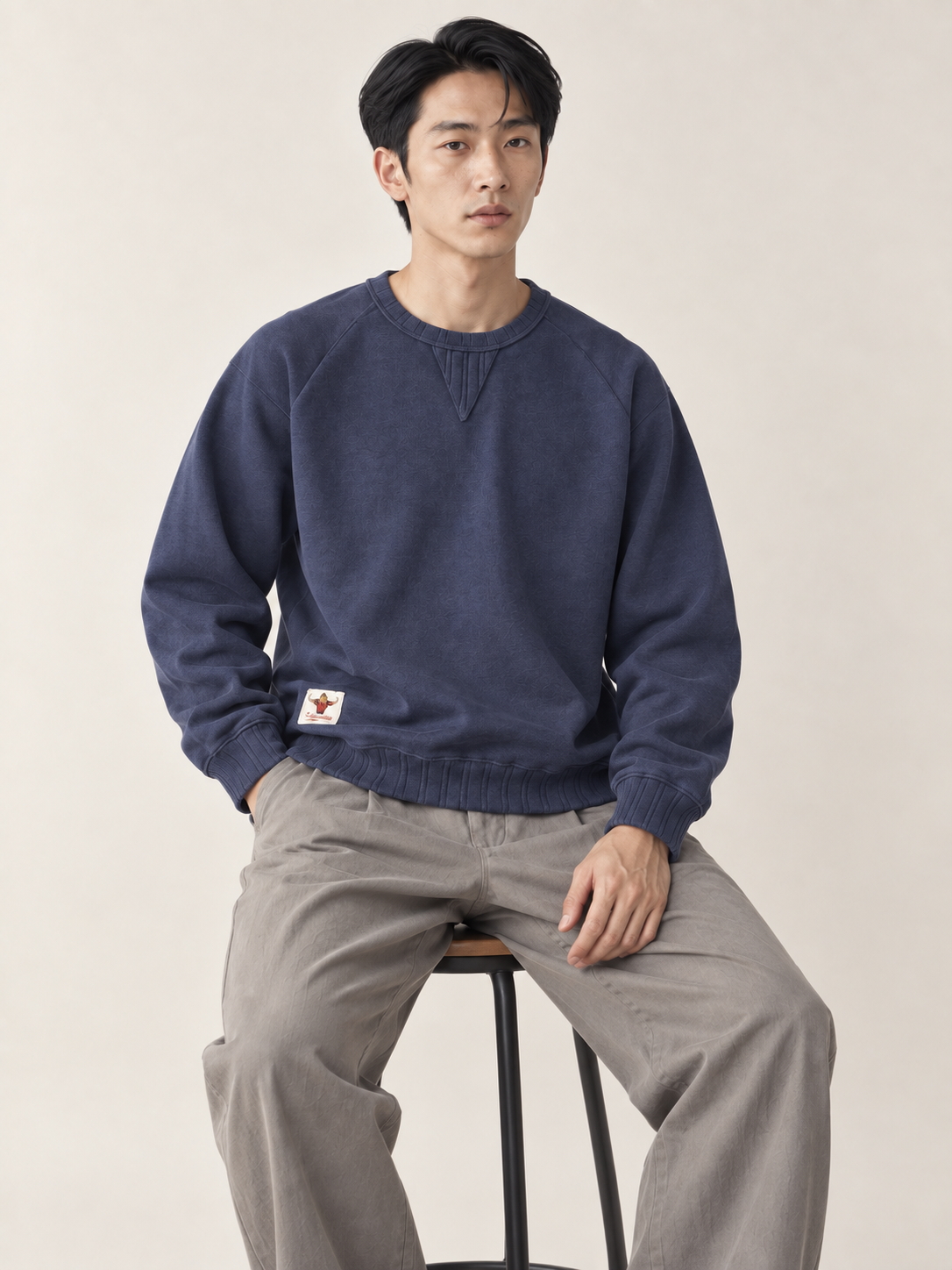 [color:navy-blue] Washed Crewneck Sweatshirt — model studio view