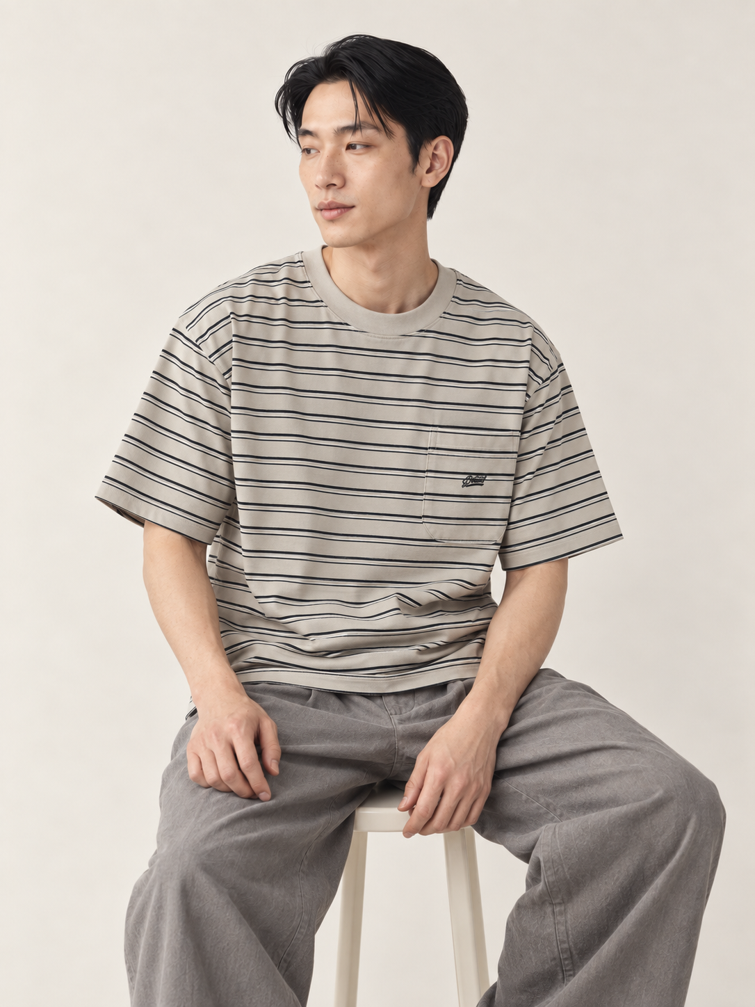 [color:khaki] Striped Pocket Tee — model natural studio view