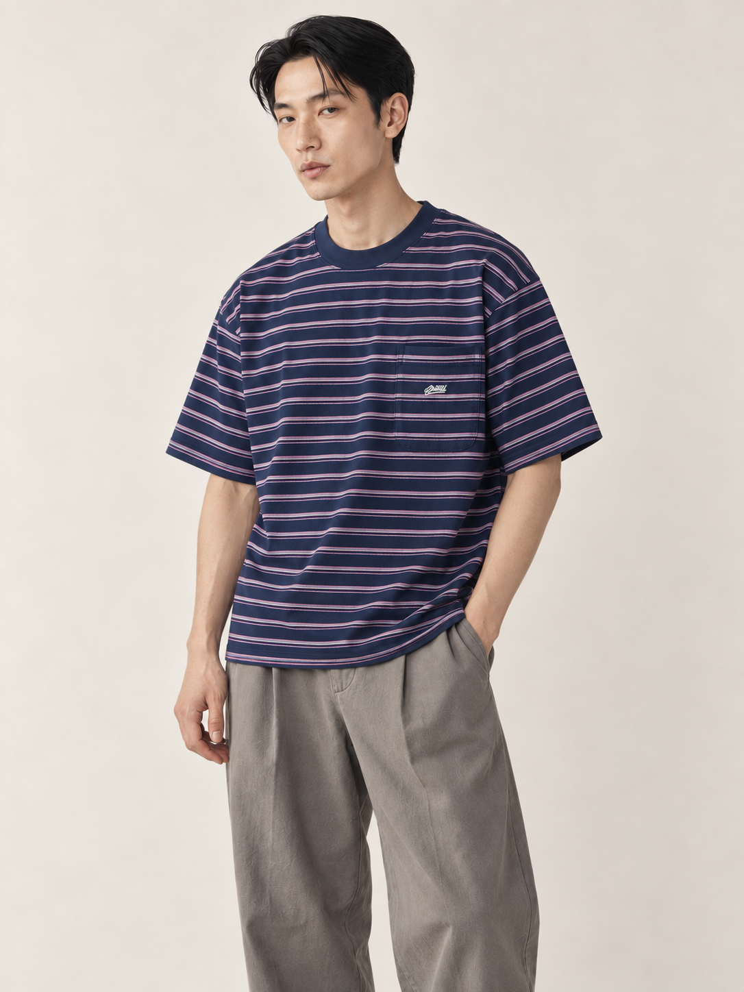 [color:navy-stripe] Striped Pocket Tee — model natural studio view