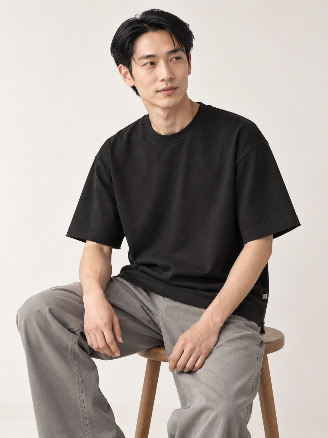 [color:black] Raw-Edge Crewneck Tee — model natural studio view
