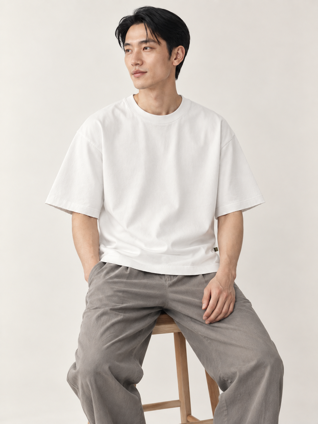 [color:white] Raw-Edge Crewneck Tee — model natural studio view