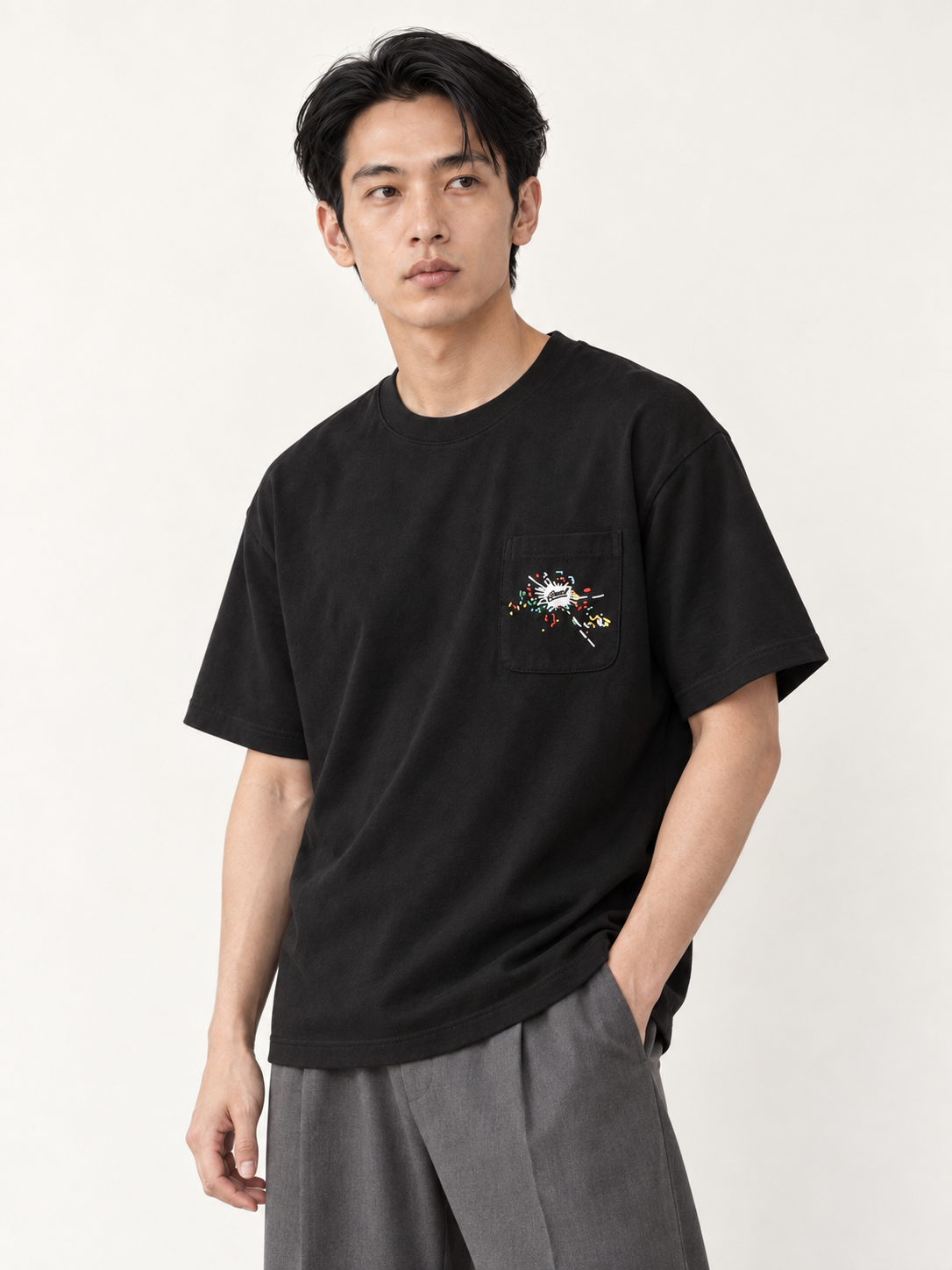 [color:black] Embroidered Pocket Tee — relaxed studio model