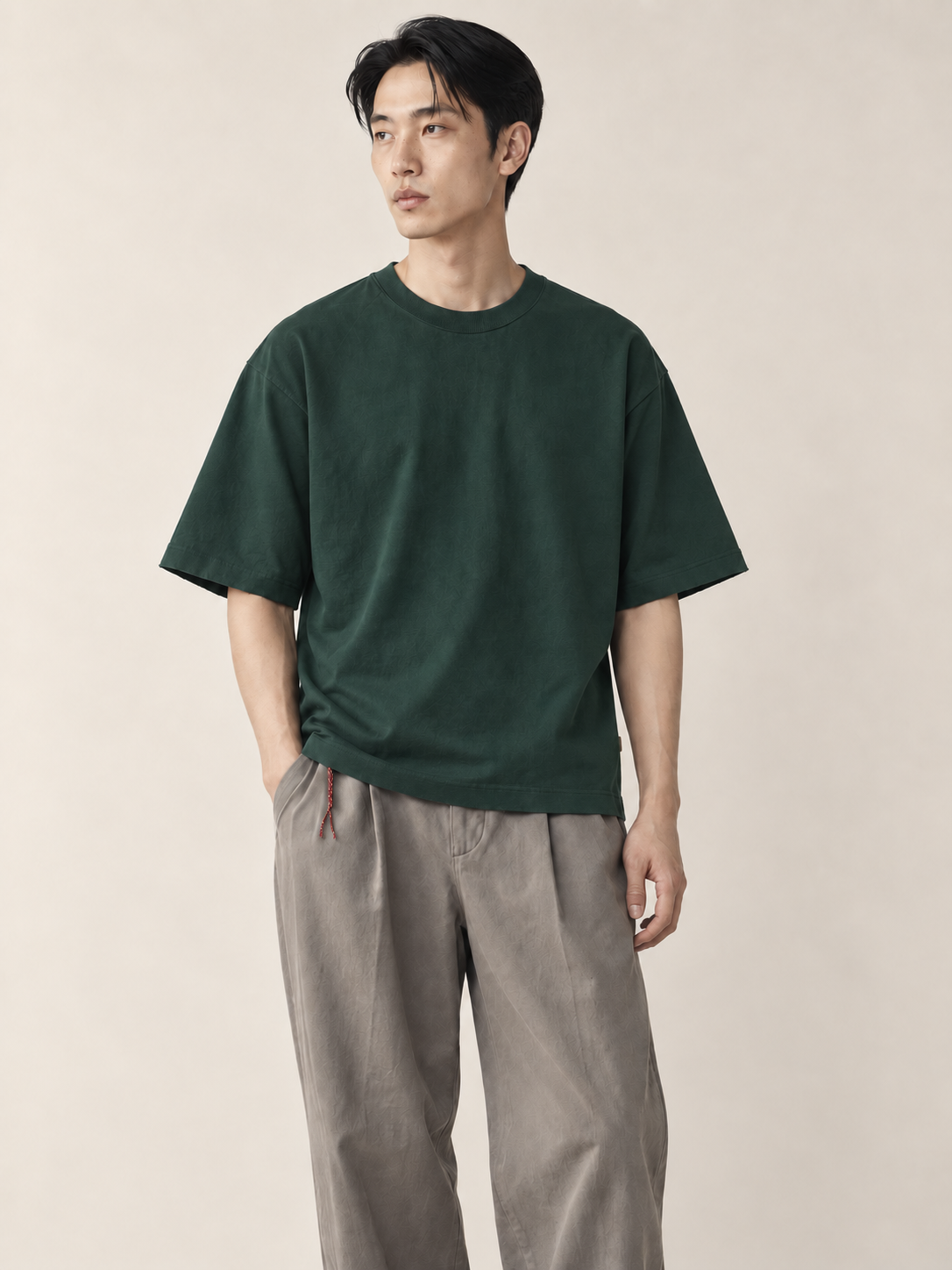 Editorial model hero view — Drop-Shoulder Crewneck Tee / Heavyweight in Dark Green