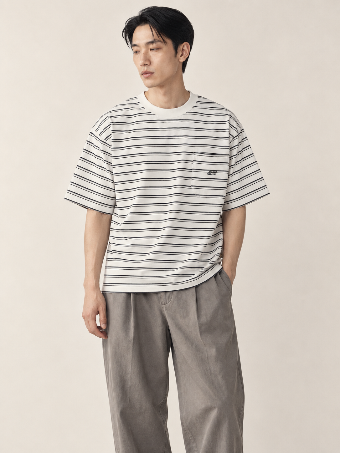 Editorial model hero view — Striped Pocket Tee / Yarn-Dyed Cotton in White