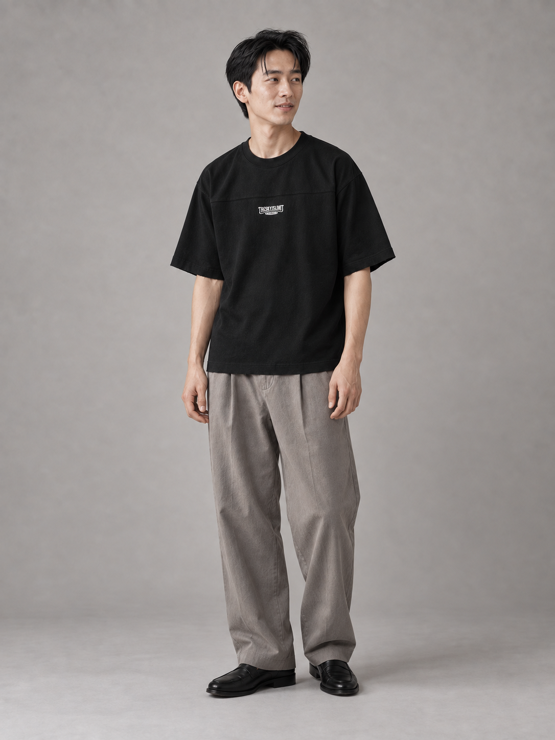 [color:black] Compact-Neck Tee — relaxed standing studio model