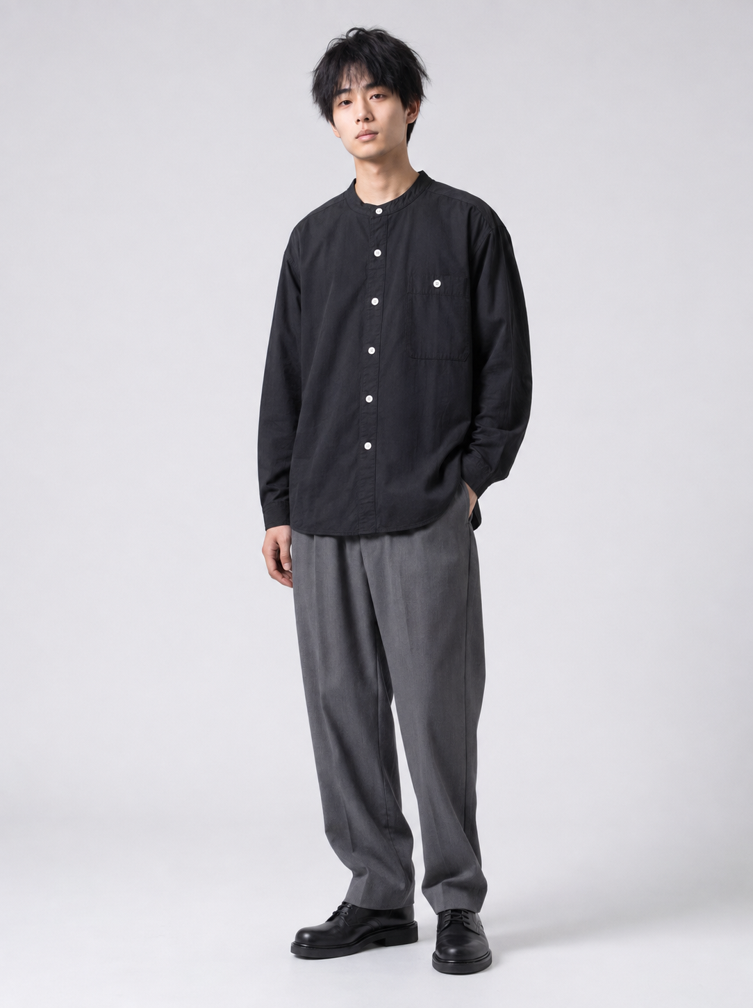 [color:black] Black Henry collar shirt on Japanese male model, relaxed pose