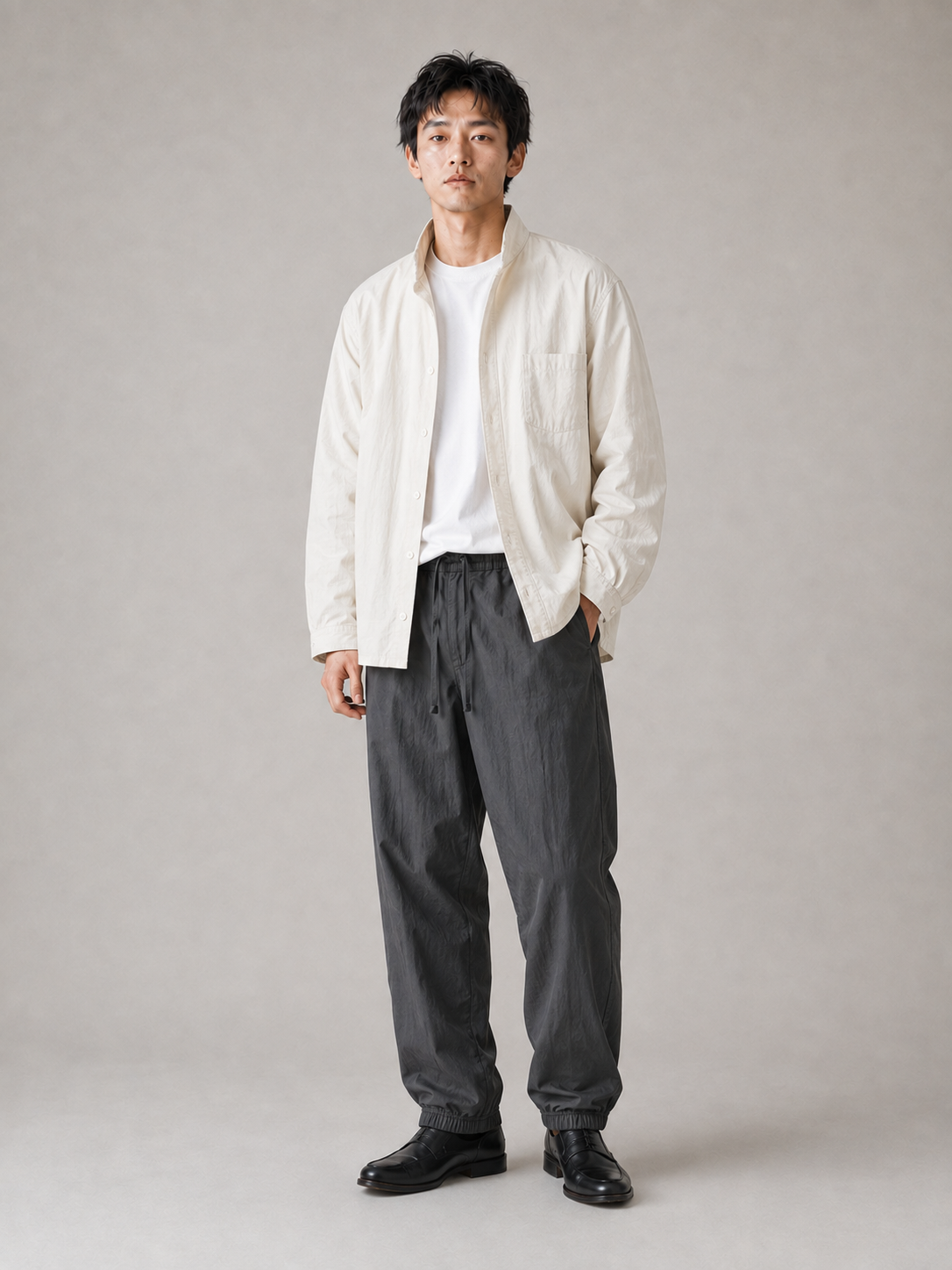 [color:dark-gray] Lightweight drawstring joggers model pose 1