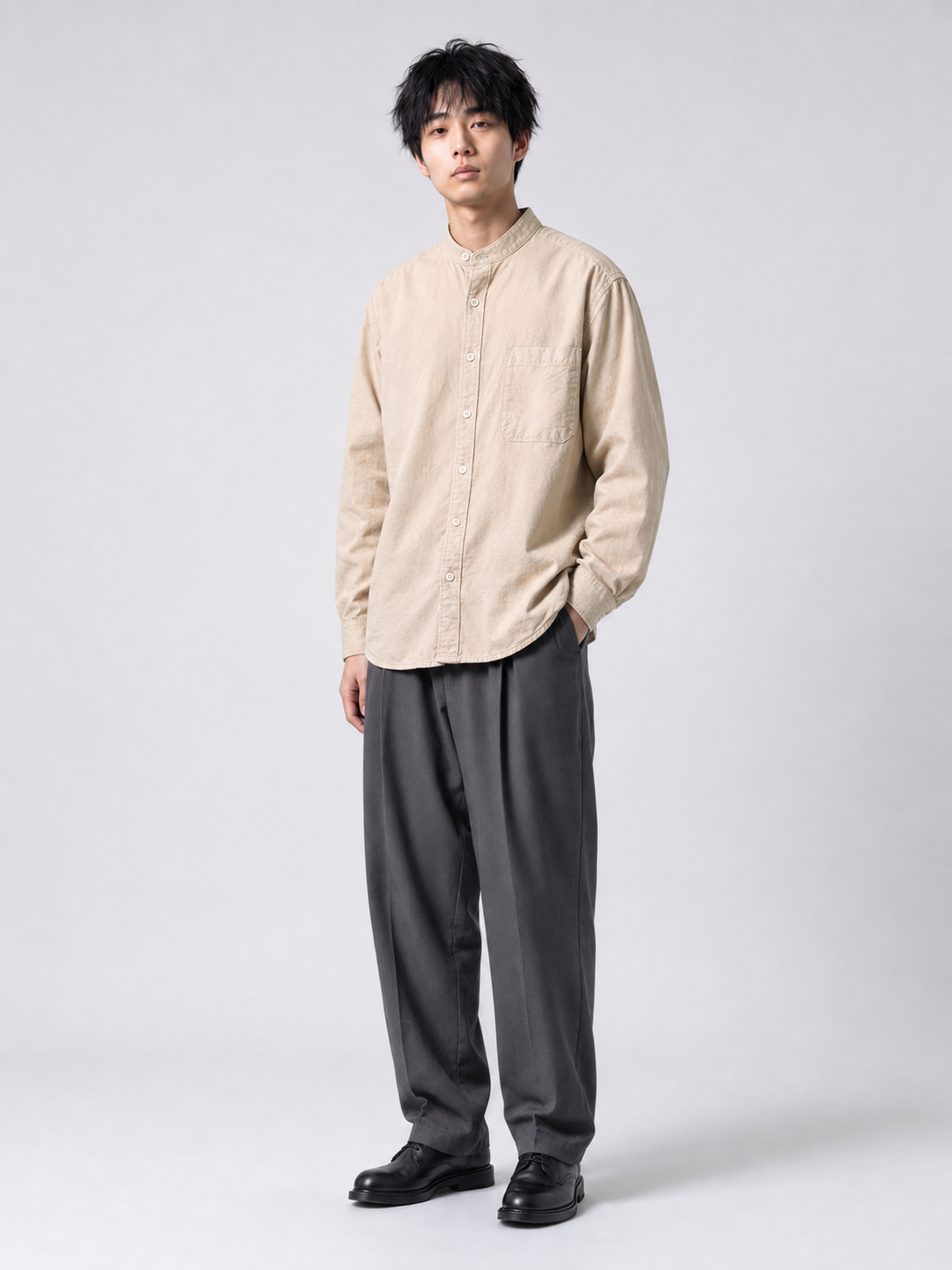 [color:apricot-color-m11] Cotton-linen band-collar shirt in apricot, model three-quarter view