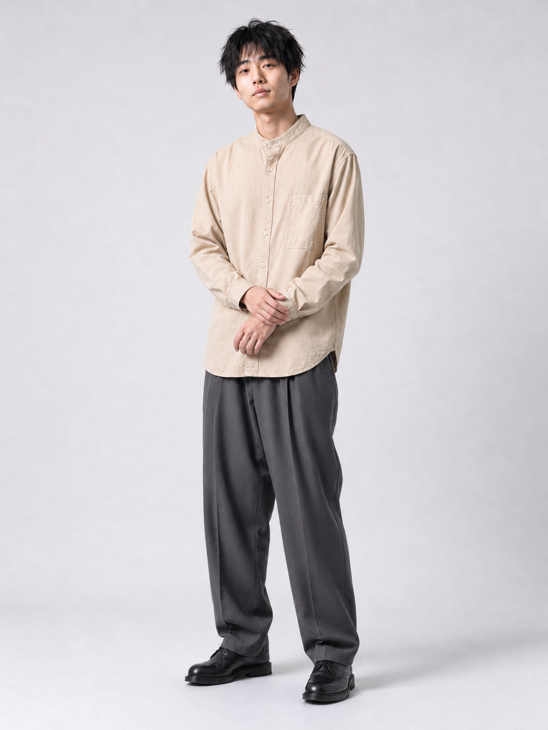 [color:apricot-color-m11] Cotton-linen band-collar shirt in apricot, model relaxed pose