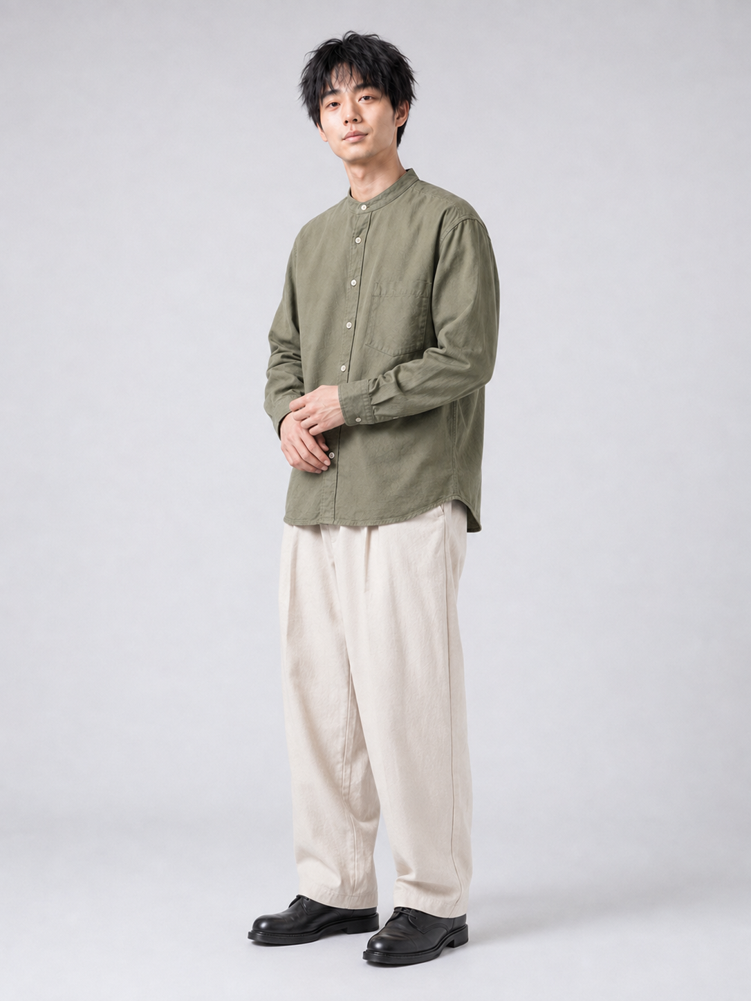 [color:army-green-m11] Cotton-linen band-collar shirt in army green, model relaxed pose