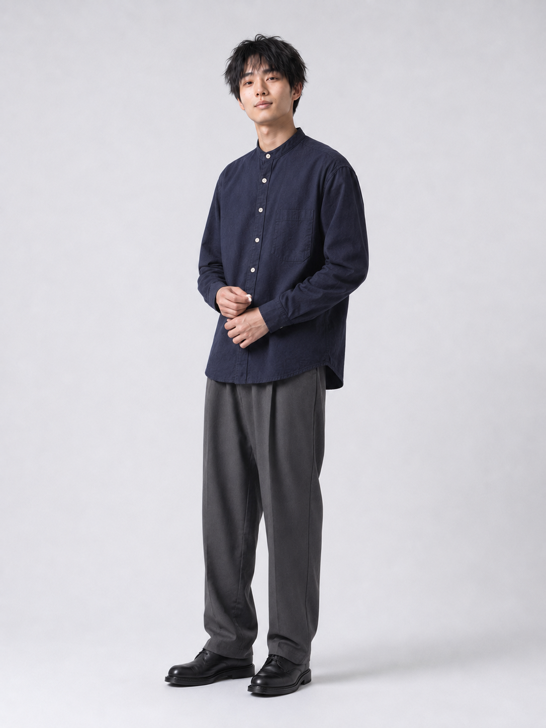 [color:navy-blue-m11] Cotton-linen band-collar shirt in navy blue, model relaxed pose
